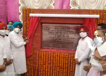 Cabinet Minister Mr Balbir Singh Sidhu laying the foundation stone of the hospital building at Doraha.