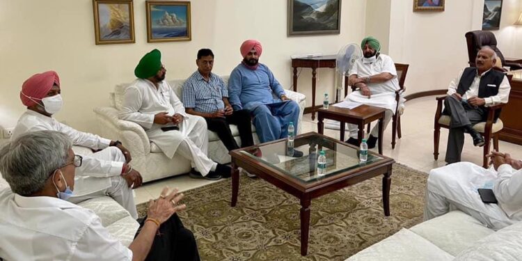 Punjab Chief Minister Capt Amarinder Singh meets newly appointed PCC president Navjot Singh in his office in the Secretariat. 
Others present included Brahm Mohindra, Manpreet Singh Badal and Vijay Inder Singla.