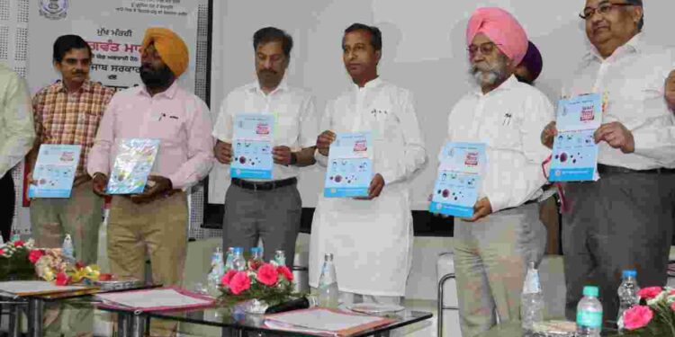 Dr. Vijay Singla Health and Family welfare minister Punjab releasing health department magzine.