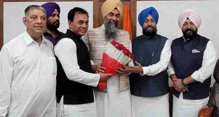 Punjab Vidhan Sabha Speaker S. Kultar Singh Sandhwan interacting with LoP Mr. Partap Singh Bajwa at his chamber in Punjab Vidhan Sabha, on Friday.