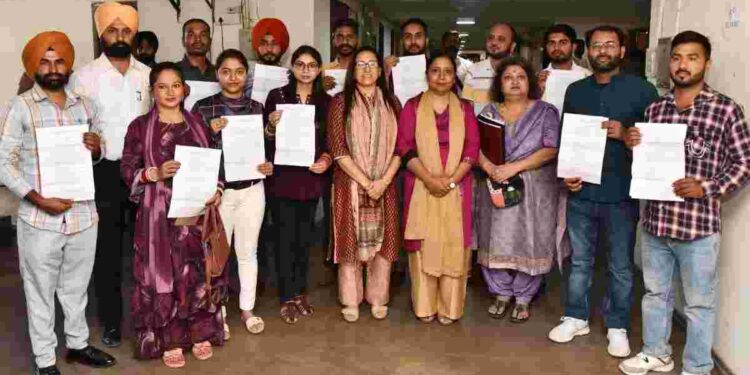 DR. BALJIT KAUR HANDS OVER APPOINTMENT LETTERS TO ELEVEN CLERKS, AT SOCIAL SECURITY DEPARTMENT