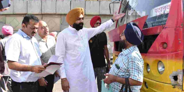 Punjab Transport Minister Laljit Singh Bhullar along with officials checking documents of buses plying on roads at local Rama Mandi Chowk and Kartarpur on Monday morning.