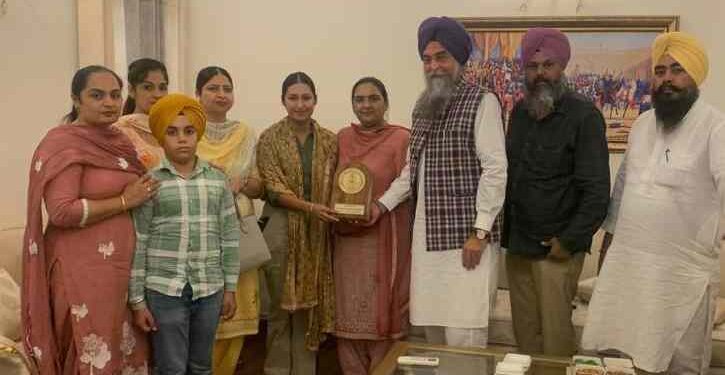 PVS Speaker Kultar Singh Sandhwan and his wife honour flying Officer Ivraj Kaur upon her arrival in Punjab