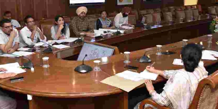 The Health Minister was chairing a meeting with the engineers and officers