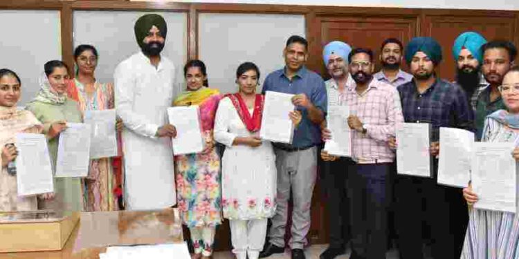 Minister Laljit Singh Bhullar hands over appointment letters to 10 steno-typists