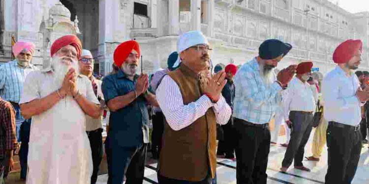 Chief Secretary KAP Sinha pays obeisance at Sri Darbar Sahib and Sri Durgiana Mandir