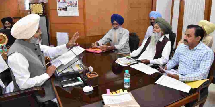 Finance Minister Harpal Singh Cheema Assures Life Insurance Coverage for AIDS Control Society Employees