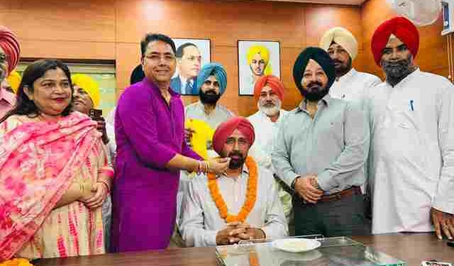 BALJINDER DHILLON ASSUMES OFFICE AS CHAIRMAN OF PUNJAB AGRO FOODGRAINS CORPORATION IN PRESENCE OF AMAN ARORA