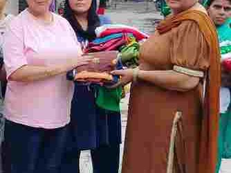 Anmol Muskan Kanti W/o Deep Singh Charitable Trust distributes clothes to needy families in Village Gharuan