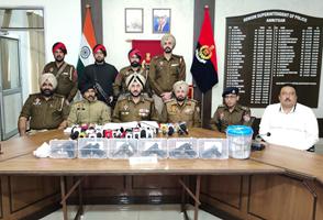 FIVE LINKED TO CROSS-BORDER SMUGGLING NETWORK HELD WITH SIX PISTOLS, 115GMs HEROIN & ₹11.9L DRUG MONEY FROM AMRITSAR