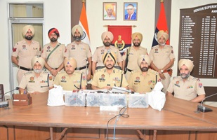 CROSS-BORDER SMUGGLING MODULE BUSTED IN AMRITSAR; TWO HELD WITH 4KG HEROIN, FOUR PISTOLS