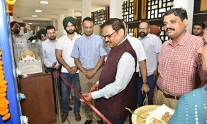 Chief Secretary K.A.P. Sinha launches state of the art vending machine dispensing Milkfed products