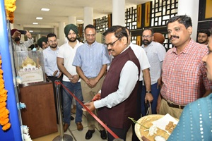 Chief Secretary K.A.P. Sinha launches state of the art vending machine dispensing Milkfed products